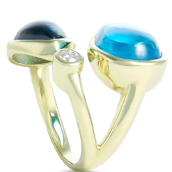 Cabochon Ring with Pear Shaped Blue Topaz Gemstones and Bezel Set Diamond, 14K Yellow Gold