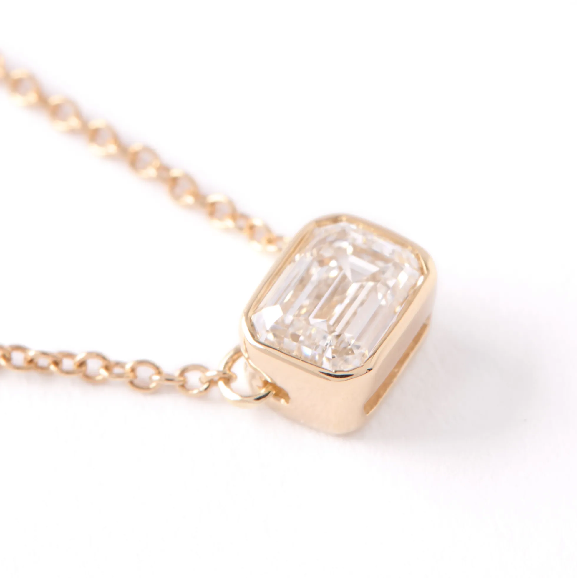 Emerald Cut Diamond Invisible Bezel Pendant, ½ Carat Total Weight, 14K Yellow Gold