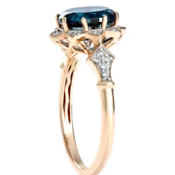 Oval Blue Topaz and Diamond Ring, 1/10 Total Carat Weight, 14K Rose Gold