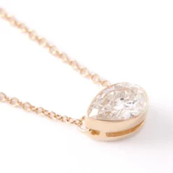 Pear Diamond Invisible Bezel Pendant, ½ Carat Total Weight, 14K Yellow Gold