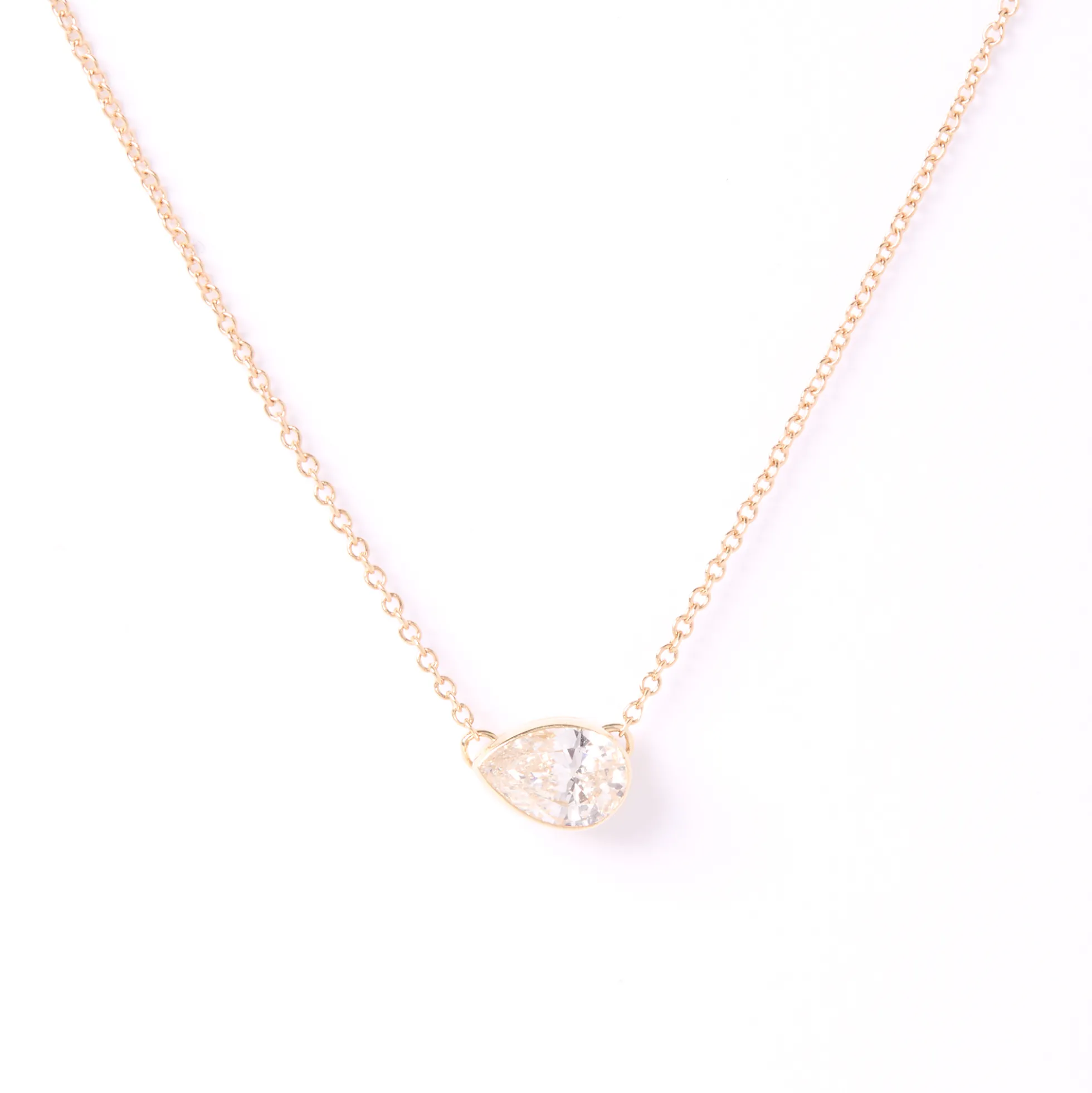 Pear Diamond Invisible Bezel Pendant, ½ Carat Total Weight, 14K Yellow Gold